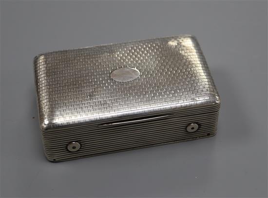 A late 18th/early 19th century French engraved and reeded white metal rectangular musical box (a.f.), 88mm.